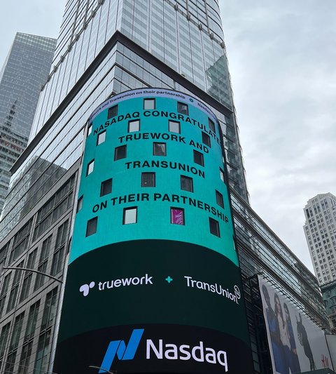 Nasdaq tower billboard in Times Square congratulating Truework and TransUnion on their partnership